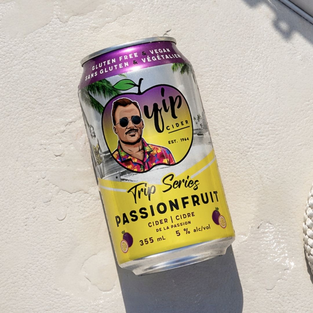 Yip Trip Series Passionfruit can on white sand