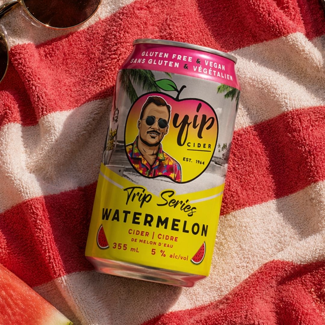 Yip Trip Series Watermelon can on a red and white striped towel