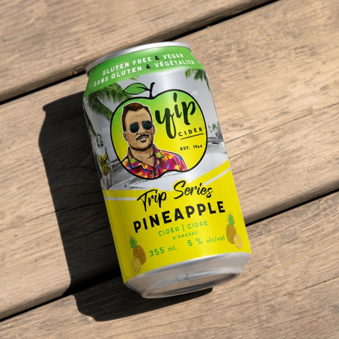 Yip Trip Series Pineapple can on a wooden deck